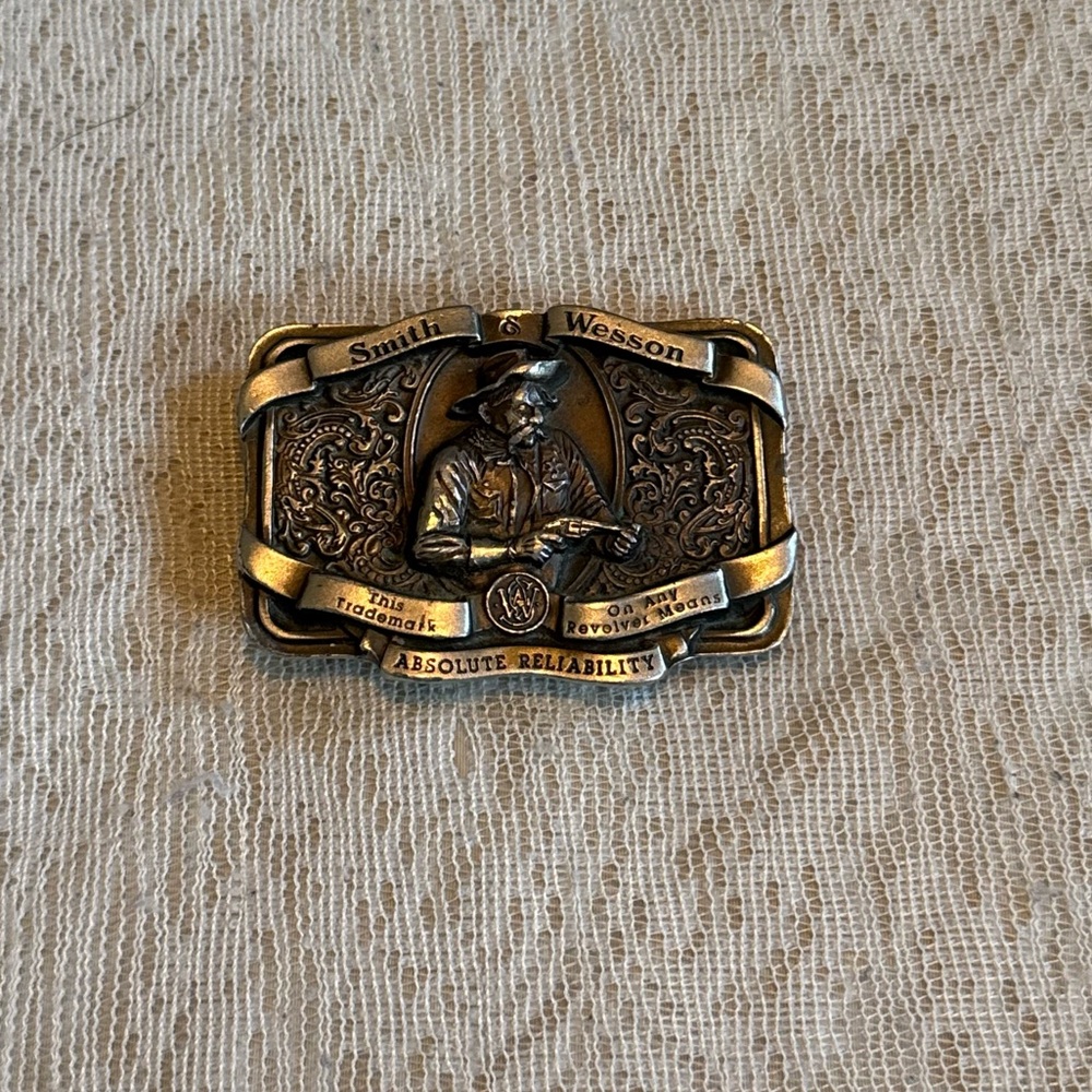Vintage Smith & Wesson metal logo 1989 C-300 belt buckle